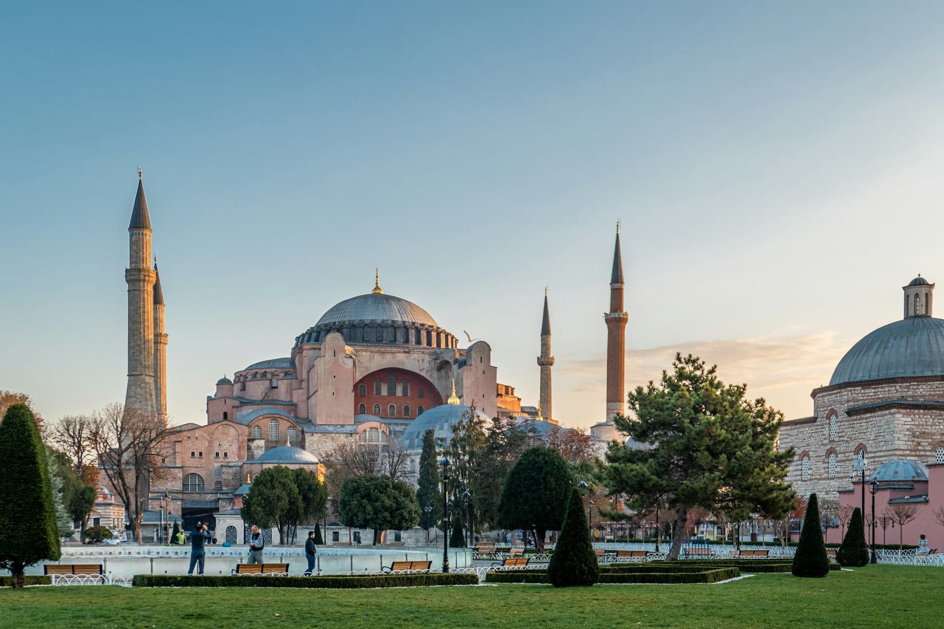 Hot air balloons over Cappadocia fairy chimneys at dawn